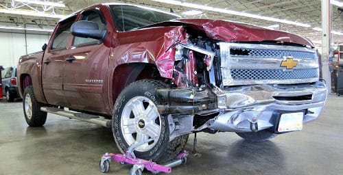 Wrecked Chevy Silverado after a collision
